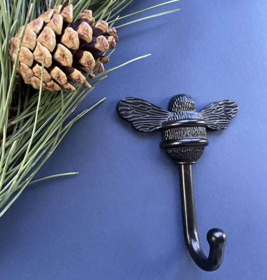 A picture of a Brass Bee coat hook in black finish.