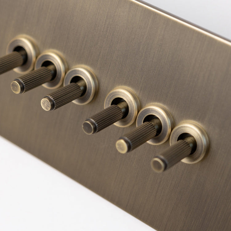 Antique Brass Switches and Sockets - Straight Knurled Design