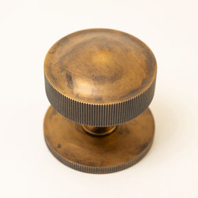 Straight Knurled Design Solid Brass Centre Door Knob - Brass bee