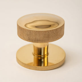 Straight Knurled Design Solid Brass Centre Door Knob - Brass bee