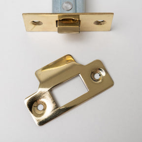 Bolt Through Tubular Latch - Case 76mm - Backset 57mm - Polished Brass Plated - Designer Levers - Brass bee