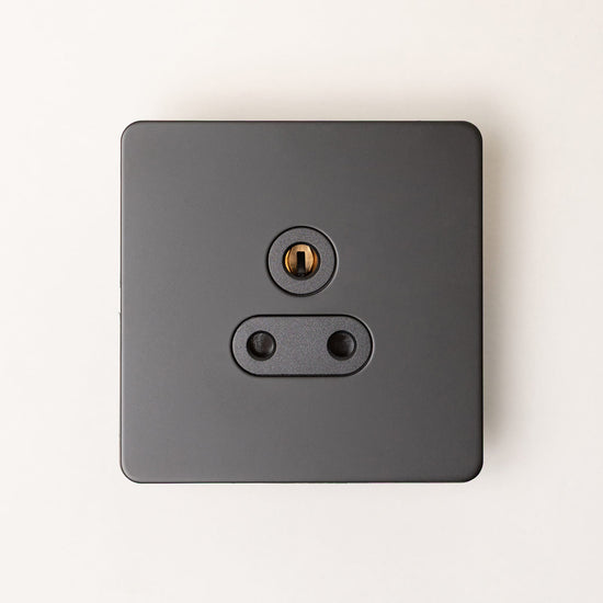Foundry Series Knurled Toggle Switch and Sockets – Matte Black - Brass bee