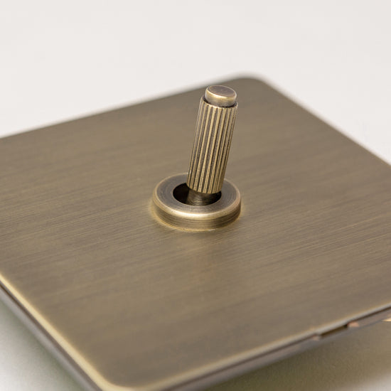 Antique Brass Switches and Sockets - Straight Knurled Design - Brass bee