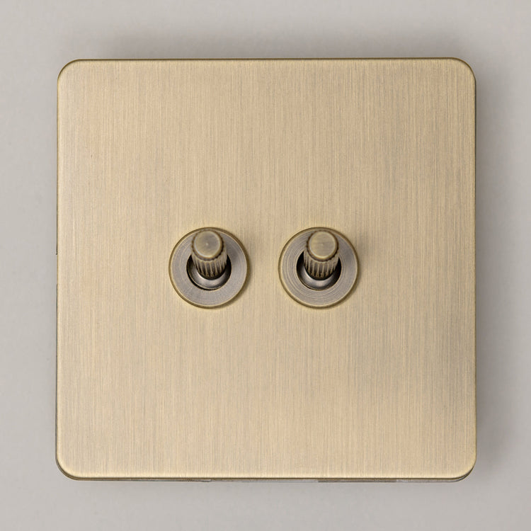 Antique Brass Switches and Sockets - Straight Knurled Design