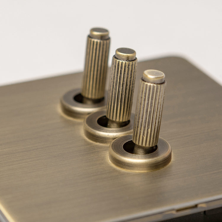 Antique Brass Switches and Sockets - Straight Knurled Design