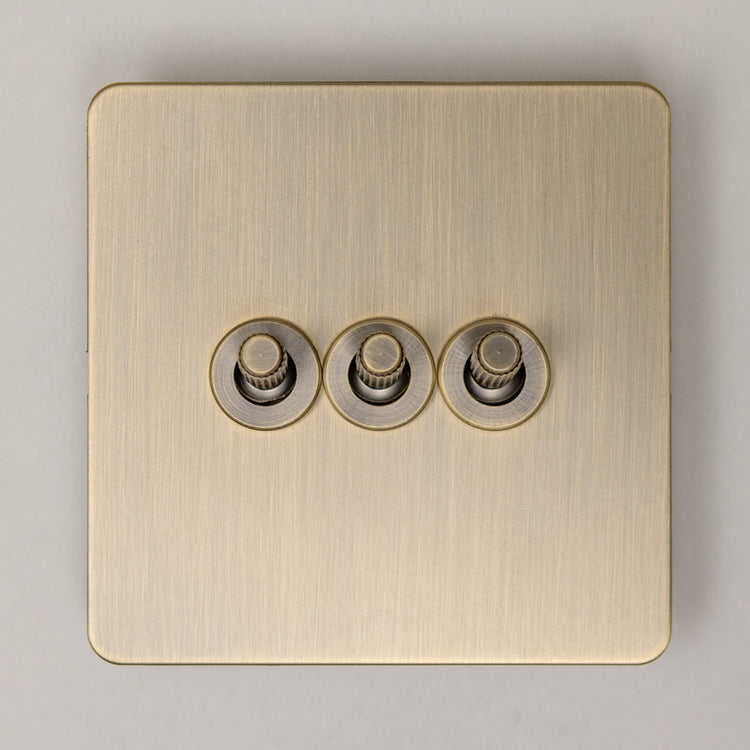 Antique Brass Switches and Sockets - Straight Knurled Design