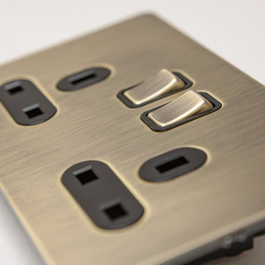 Double 13A Switched Socket in Antique Brass – Brass Bee