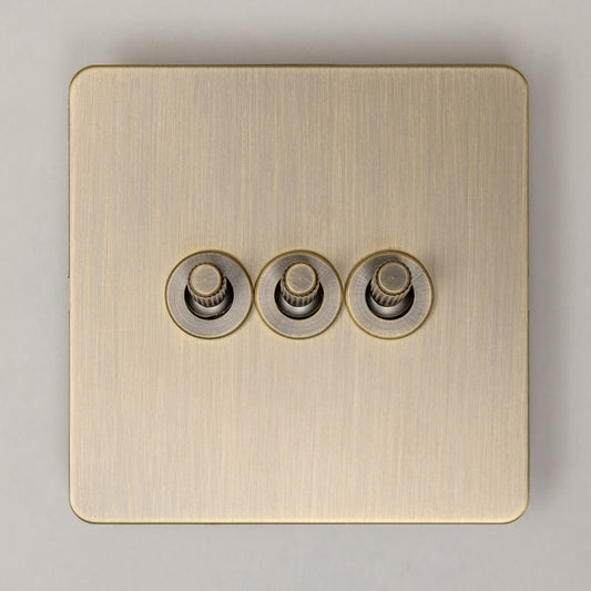 Straight Knurled 3 Gang 2 Way Toggle Switch – Antique Brass