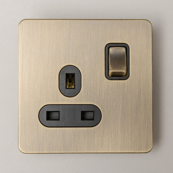 Single 13A Switched Socket – Antique Brass - Brass bee