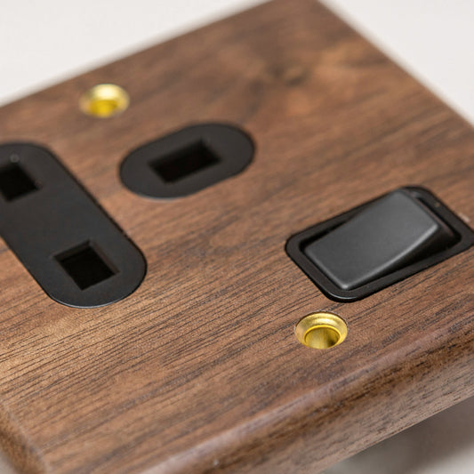 W-Series Single 13A Switched Socket in Black Walnut – Brass Bee