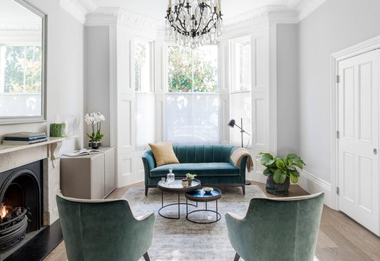 Elegant living room in a period home with vintage décor and modern touches