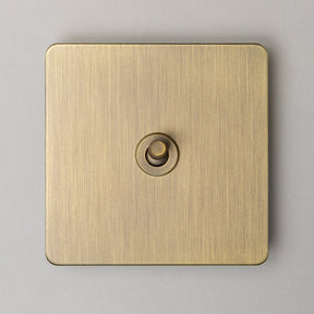 Foundry Series Knurled Toggle Switches and Sockets – Antique Brass - Brass bee