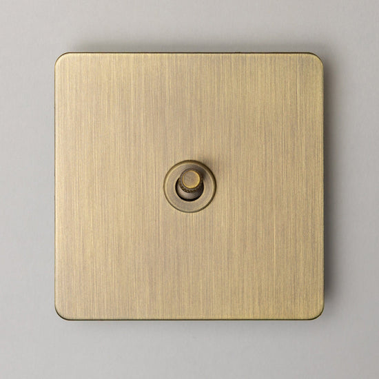 Foundry Series Knurled Toggle Switches and Sockets – Antique Brass - Brass bee