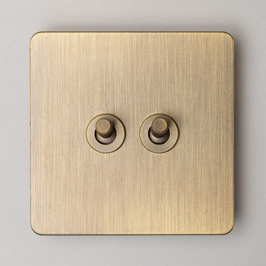 Foundry 2 Gang 2 Way Knurled Toggle Switch – Antique Brass