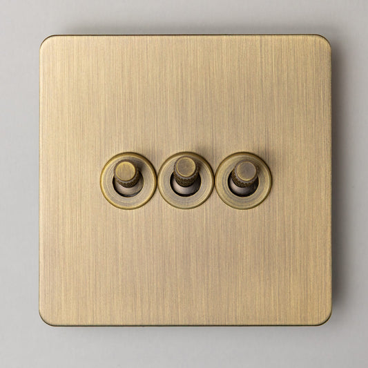 Foundry 3 Gang 2 Way Knurled Toggle Switch – Antique Brass