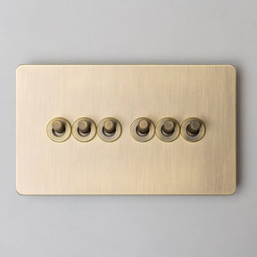 Foundry Series Knurled Toggle Switches and Sockets – Antique Brass - Brass bee