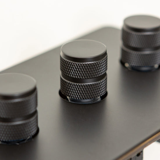 Foundry Series Knurled Toggle Switch and Sockets – Matte Black - Brass bee