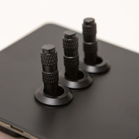 Foundry Series Knurled Toggle Switch and Sockets – Matte Black - Brass bee