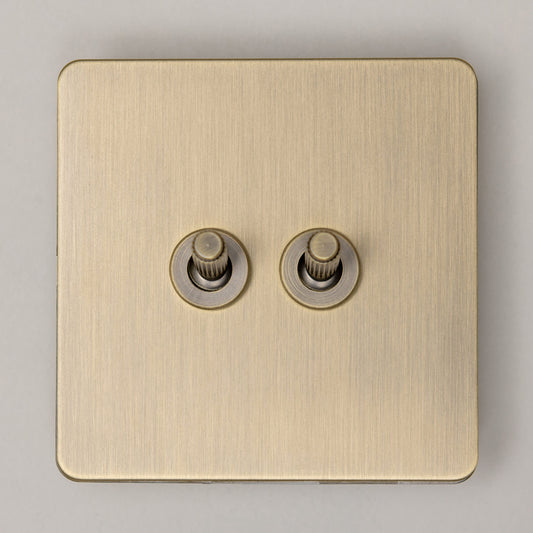 Straight Knurled 2 Gang Intermediate Toggle Switch – Antique Brass