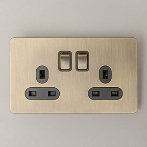 Double 13A Switched Socket – Antique Brass - Brass bee
