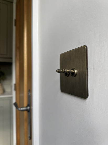 Foundry Series Knurled Toggle Switches and Sockets – Antique Brass - Brass bee