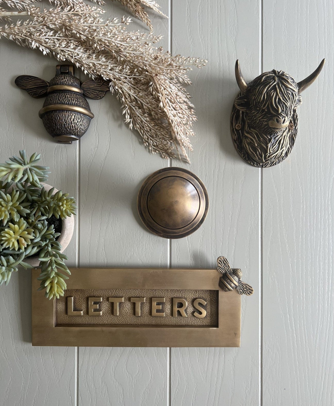 Brass bee door knocker and letter plate